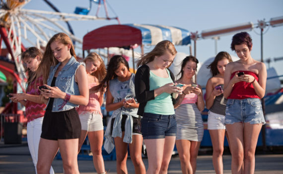 Group looking at their phones