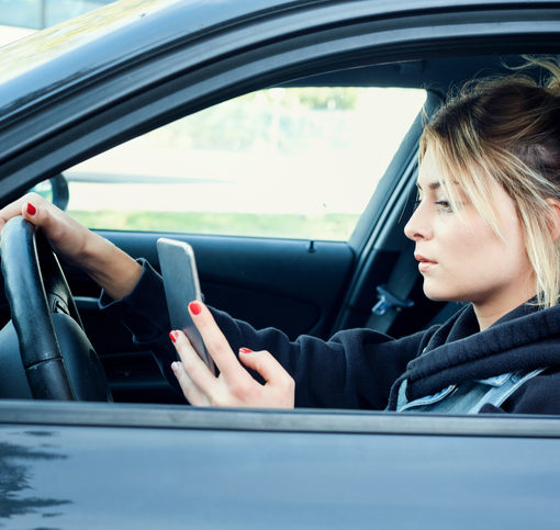 Texting While Driving: How Parental Monitoring Software Can Help