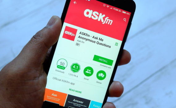 Cell phone with the app ASKfm displayed.