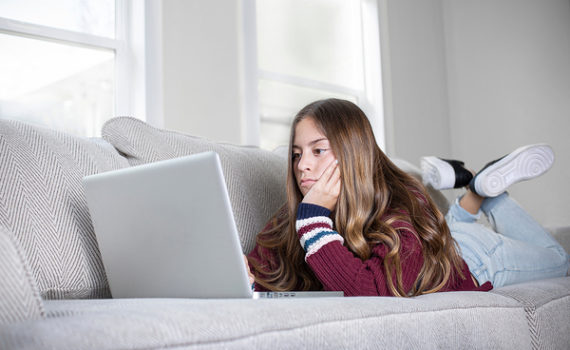Looking at a computer screen.
