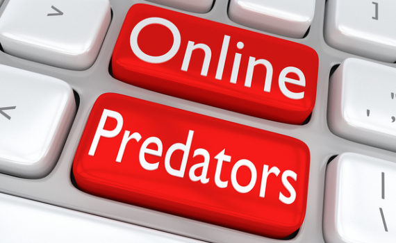 Keyboard with keys labeled Online Predators.
